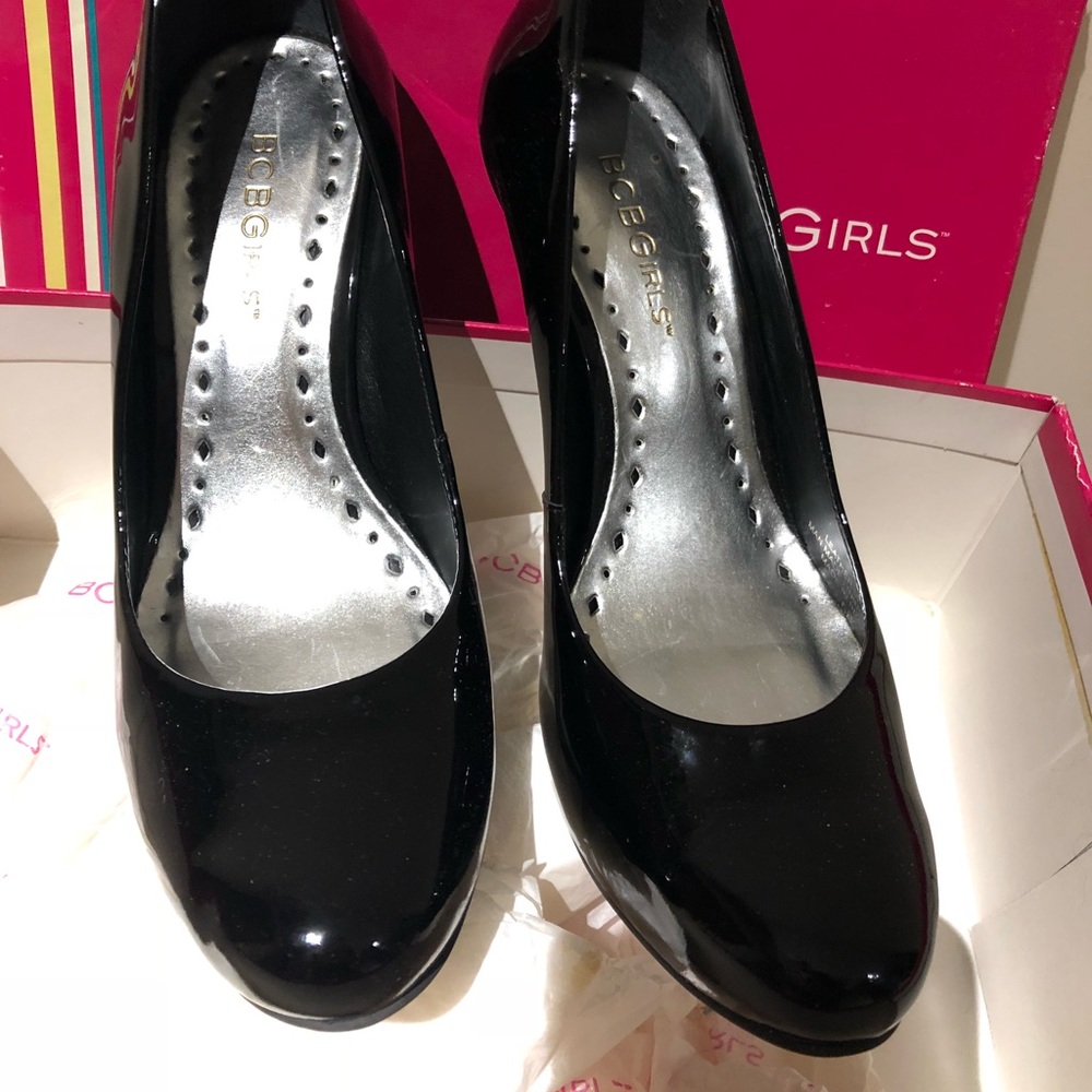 BCBGIRLS - Edith black patent pumps.